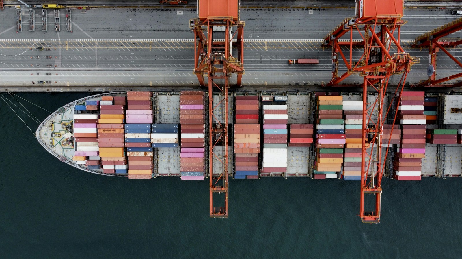 A container ship and cranes at a port